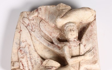 A STONE FLYING APSARAS CARVING.