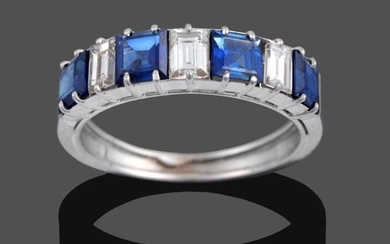 A Sapphire and Diamond Seven Stone Ring, four step cut...