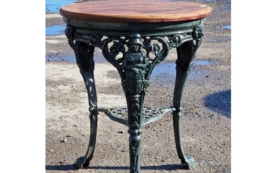 A Victorian painted cast iron Britannia pub table with pierc...