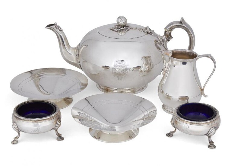 A Victorian silver teapot with wooden stand,...