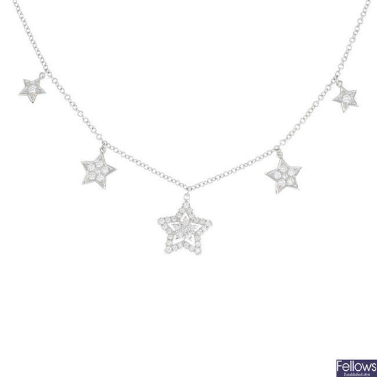 A brilliant-cut diamond star-shape necklace.