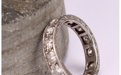 A diamond and platinum full eternity ring, the 15 round bril...