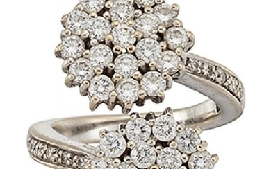 A diamond cluster ring, of crossover design,...