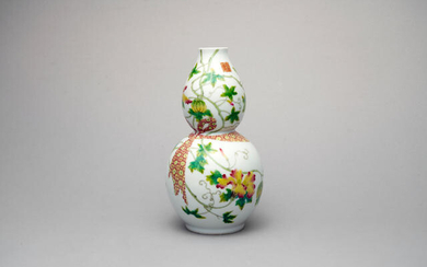 A famille-rose 'melon' gourd-shaped vase