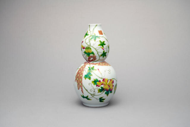 A famille-rose 'melon' gourd-shaped vase