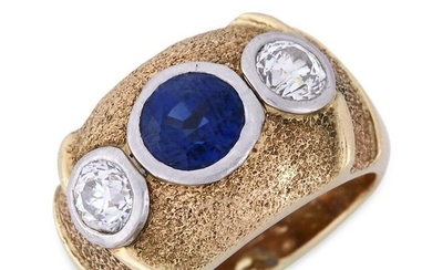 A fourteen karat gold, sapphire, and diamond ring