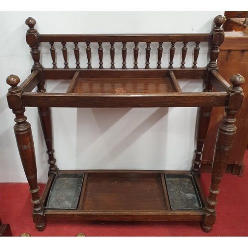 A good early 20th Century Oak Stick Stand with drip tray. W ...