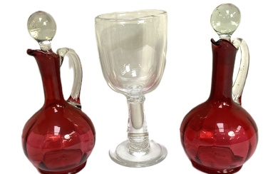 A good pair of vintage Ruby glass ewers, together with a very large glass goblet, probably mid