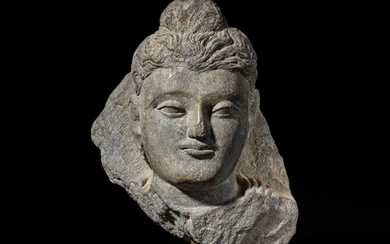 A gray schist head of Buddha, Ancient Region of Gandhara, 3rd - 4th century