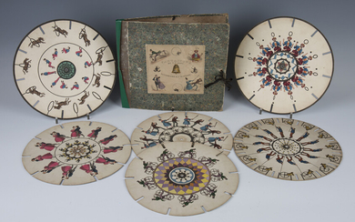 A group of 19th century Fantascope discs, comprising a set of six hand-coloured discs and their orig