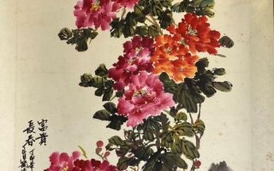 A ink on rice paper painting of colorful peonies...