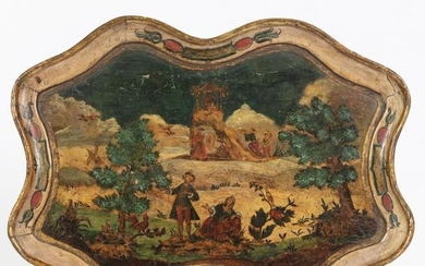 A lacquered tray with arte povera decorations