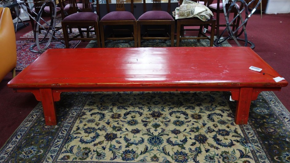 A large 20th century Chinese red lacquered coffee table, H.4...