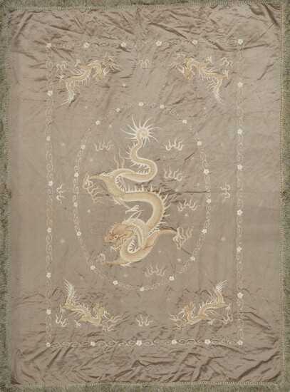 A large Chinese silk embroidered 'dragon' throw, early 20th century, decorated with a large dragon surrounded by four smaller dragons, 180 x 140cm