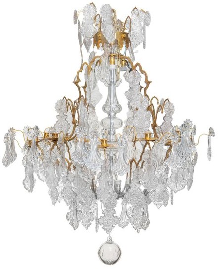 A large chandelier with gilt bronze mounts and...