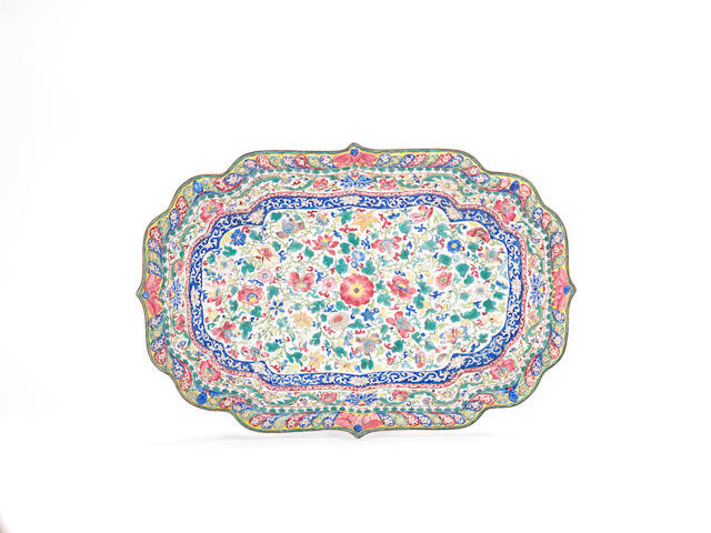 A large painted enamel shaped tray