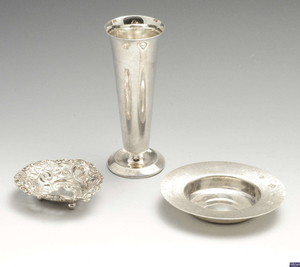 A late Victorian small silver pierced trinket dish, a modern silver armada style dish & a modern silver bud vase. (3).
