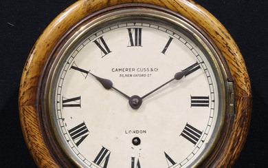 A mid 20th century oak railway or school wall timepiece, 19c...