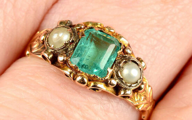 A mid Victorian gold emerald and split pearl three-stone scrolled ring.