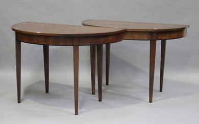 A pair of 19th century mahogany 'D'-end console tables, raised on square tapering legs, he