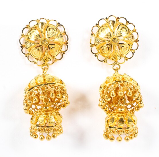 A pair of 20th century unmarked yellow metal chandelier earrings of pierced and wire work design