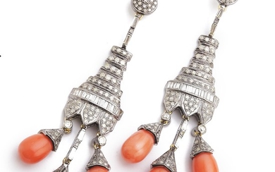 A pair of Art Deco coral and diamond ear pendants each set with cabochon corals and diamonds weighing a total of app. 4.48 ct., mounted in gold and silver. (2)