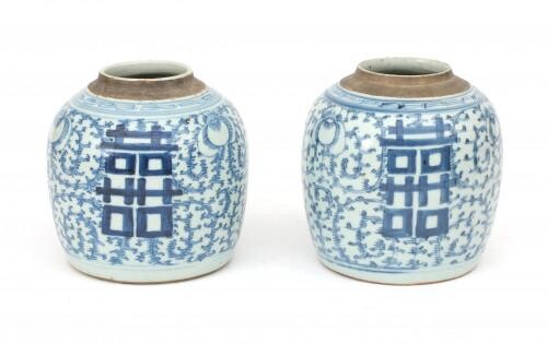 A pair of Chinese porcelain ginger jars with blue-white foliate decoration, 19th century.