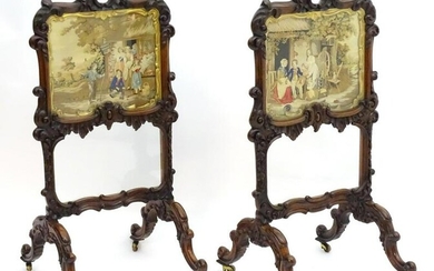 A pair of William IV rosewood fire screens, having