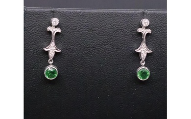 A pair of diamond and green gem stone earrings set in 18ct g...
