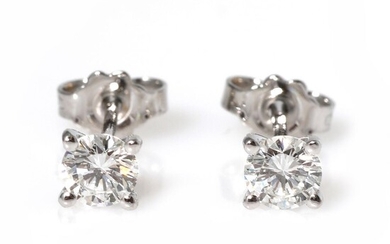 SOLD. A pair of diamond ear studs each set with a diamond weighing a total of app. 0.62 ct., mounted in 18k white gold. F/VS-SI. (2) – Bruun Rasmussen Auctioneers of Fine Art