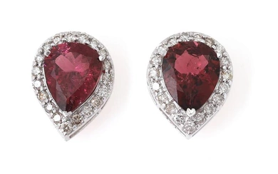 A pair of ear studs each set with a pear-shaped tourmaline weighing...
