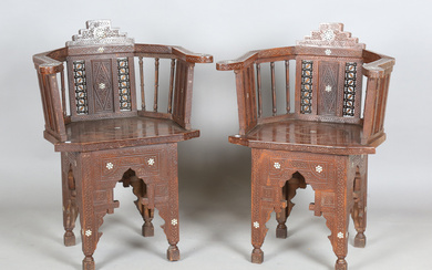 A pair of late 19th/early 20th century Middle Eastern hardwood and mother-of-pearl inlaid tub back c