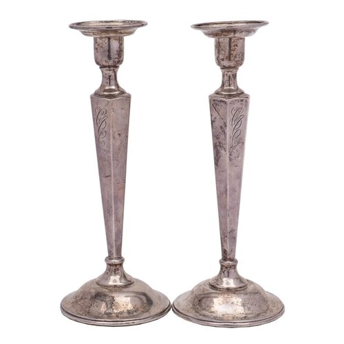 A pair of silver candlesticks, unmarked, possibly Canadian: ...