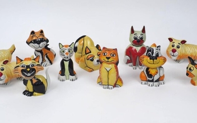 A quantity of Lorna Bailey pottery cats and dogs, 20th century and later, to include three yellow terriers, 15cm long, and various others in similar colour way, signatures to bases, tallest 14cm high, (11)