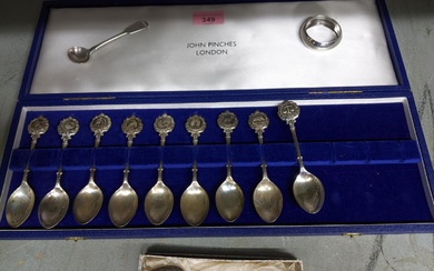 A set of cased John Pinchee zodiac silver spoons,...