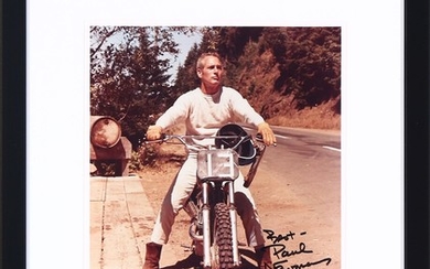 A signed colour photograph of the American actor, activist etc. Paul Newman (1925–2008) on his Czech CZ 250 motorbike from 1967.