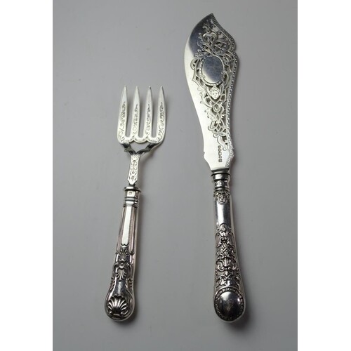 A silver fish knife and fork server. Fish knife is hallmarke...