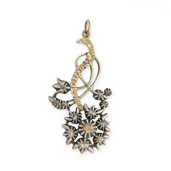 AN ANTIQUE DIAMOND FLOWER PENDANT in yellow gold and