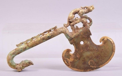 AN ARCHAIC STYLE CHINESE GILT JADE RITUAL AXE, with