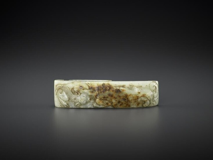 AN ARCHASITIC JADE SCABBARD SLIDE WITH DRAGON