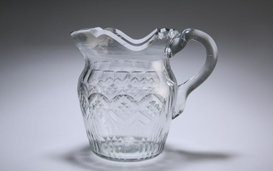 AN IRISH GLASS WATER JUG, CIRCA 1820, with deep