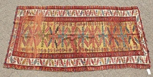 AN OLD CAUCASIAN RUNNER with typical motifs within a