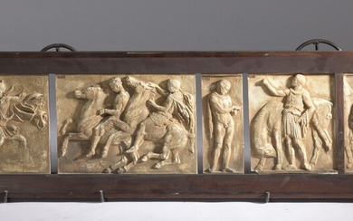 Achille COLLAS. Suite de dix métopes à décor antique de figures en bas-relief. Plâtre pâtiné....