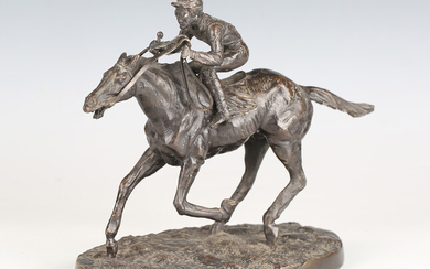 After Pierre-Jules Mêne - a 20th century patinated cast bronze model of a jockey on horseback