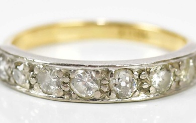 An 18ct yellow gold eight stone diamond half eternity ring,...