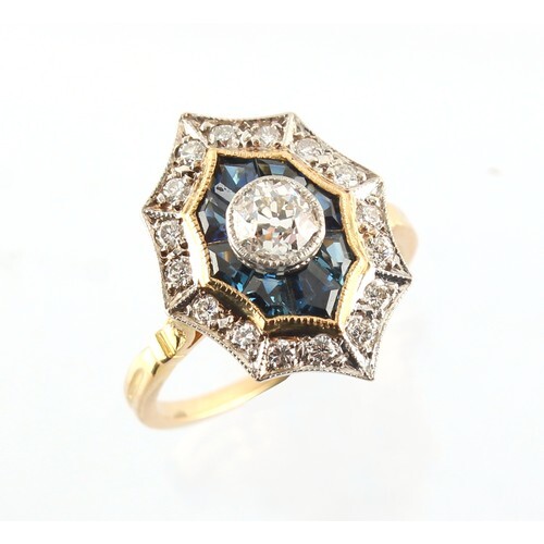 An 18ct yellow gold sapphire & diamond cluster ring with con...