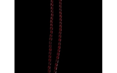 An Art Deco single row cherry look amber style bead necklace...