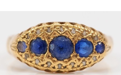 An Edwardian 18ct gold sapphire and diamond chip boat shape ...