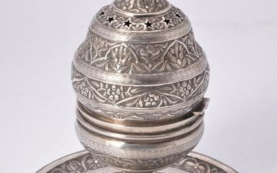 An Egyptian silver coloured incense burner on integral stand (buhurdan)