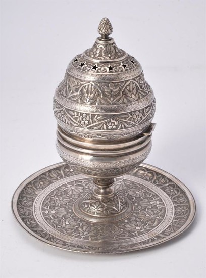 An Egyptian silver coloured incense burner on integral stand (buhurdan)